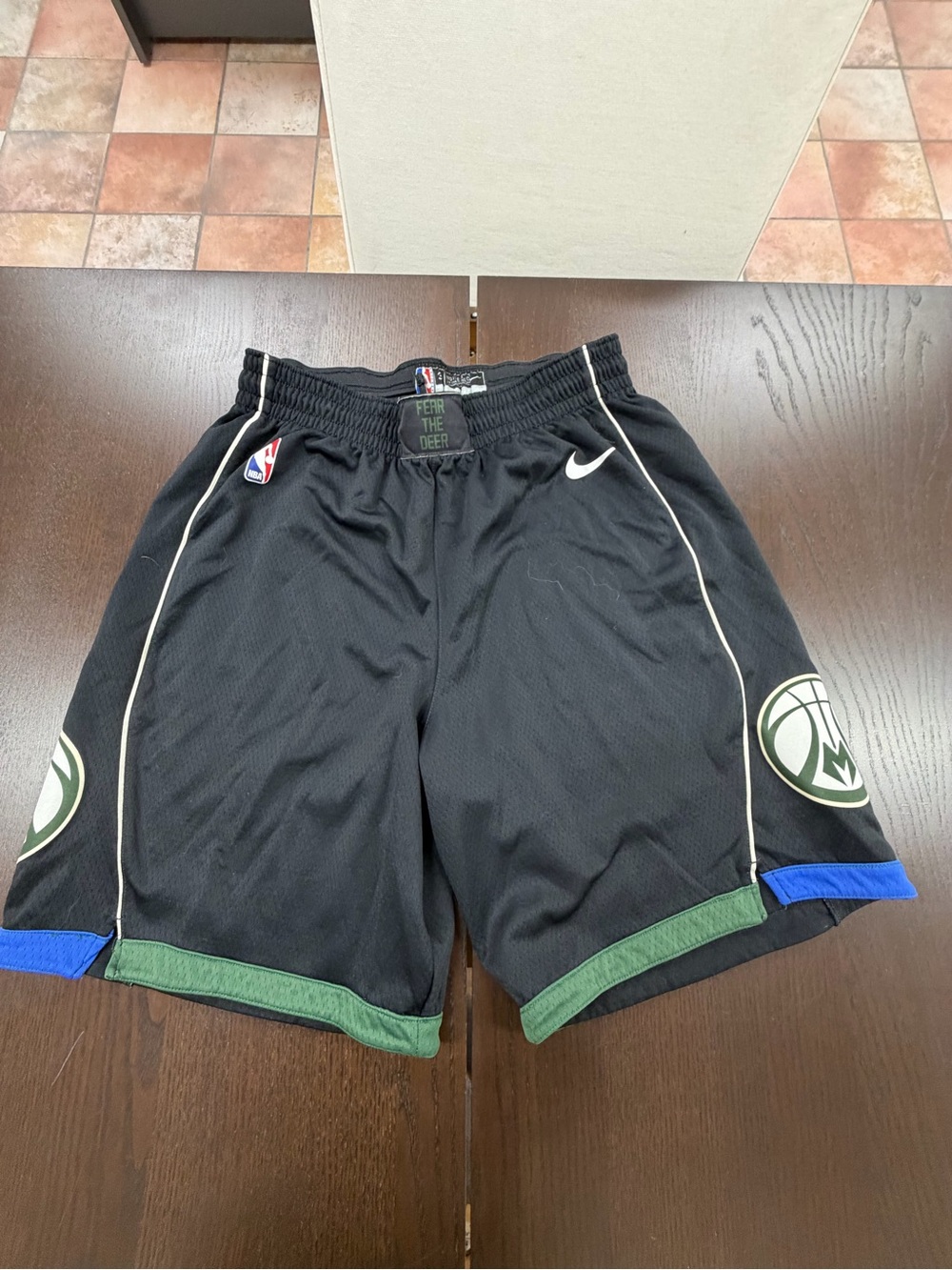 One pair of size large Nike basketball shorts